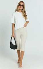 Susannah Cream Pinstripe Split-Hem Cropped Trousers – Tailored Elegance in Motion
